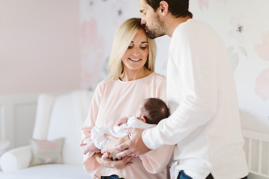 indianapolis newborn photographer lifestyle newborn pictures in pink nursery at home