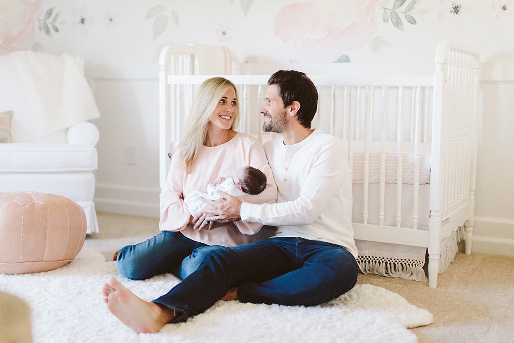 indianapolis newborn photographer lifestyle newborn pictures in pink nursery at home